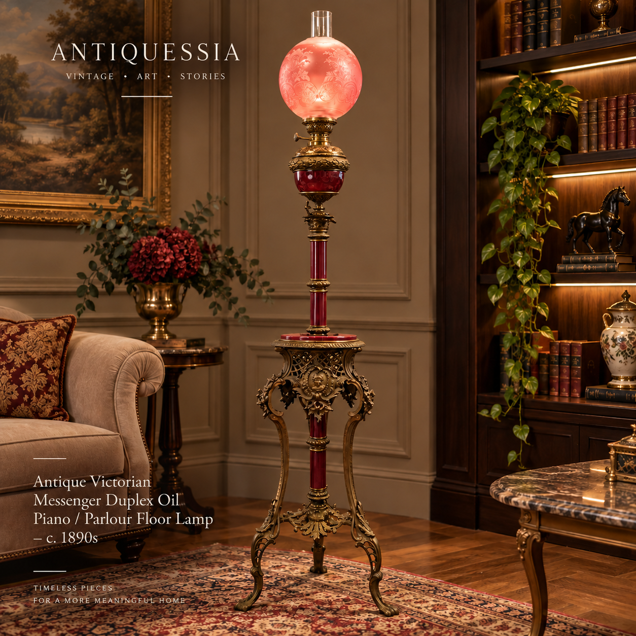 A grand antique 19th-century Victorian banquet floor oil lamp featuring an ornate gilt bronze tripod torchere stand, ruby red glass columns, and a large etched pink cranberry glass globe shade in a luxury classic study room.