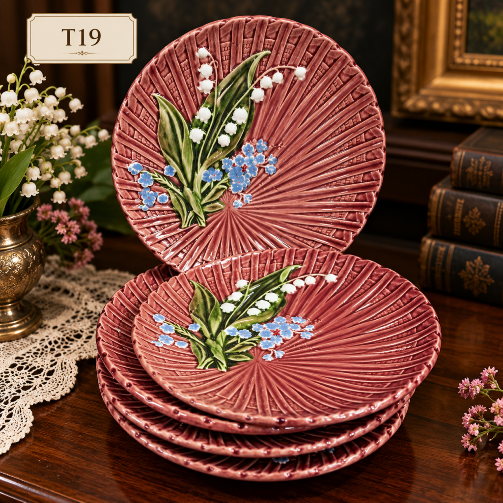 Vintage Majolica-style floral plate set from the 1950s, featuring colorful raised floral motifs, textured decorative details, and a charming mid-century European design.