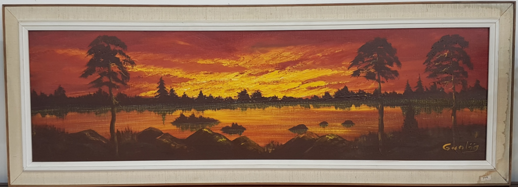 Vintage Swedish forest lake landscape at sunset, signed “Gunlög,” featuring warm evening light reflected across the water and surrounding woodland, c. 1940.