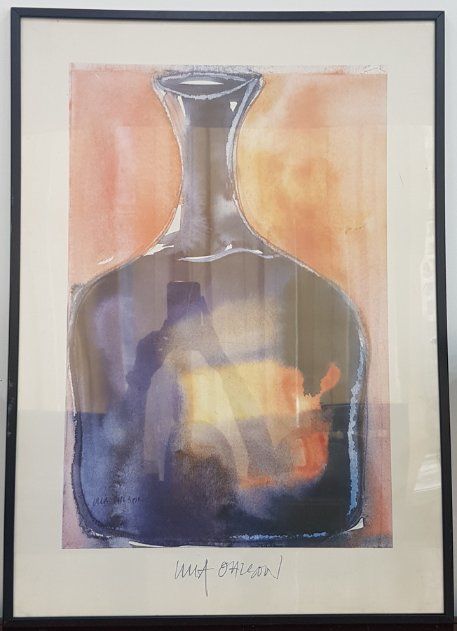 Original Swedish watercolor painting by Ulla Ohlson titled Love Drink, featuring a stylized dark blue glass bottle against an orange and red gradient background, framed in a sleek black border.