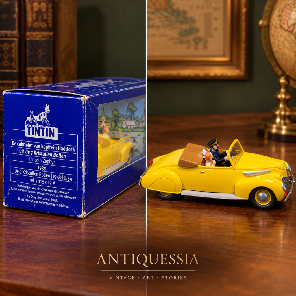 Vintage En Voiture Tintin die-cast yellow 1939 Lincoln Zephyr cabriolet model car with Captain Haddock and Tintin figurines in its original blue Editions Atlas box.