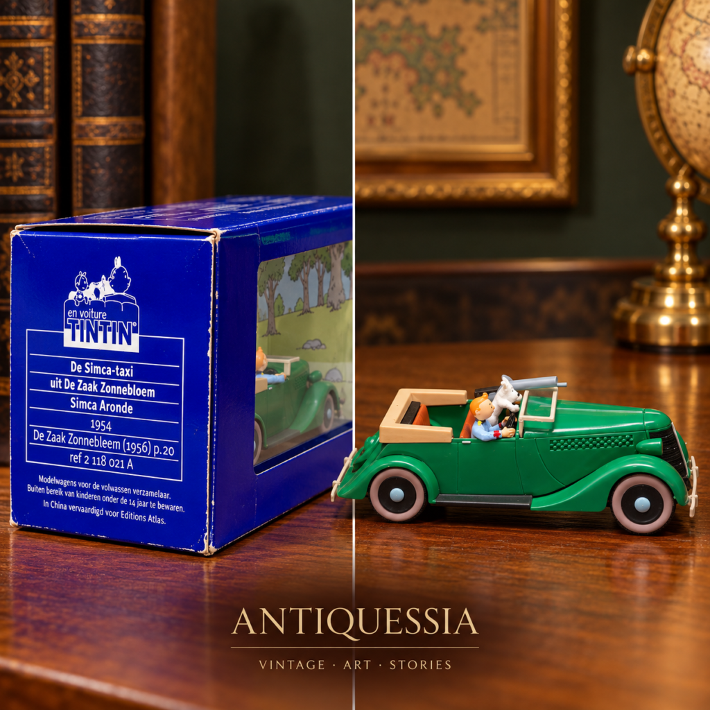 Vintage En Voiture Tintin die-cast green 1954 Simca Aronde taxi model car featuring Tintin and Snowy figurines inside its original blue and clear showcase box.