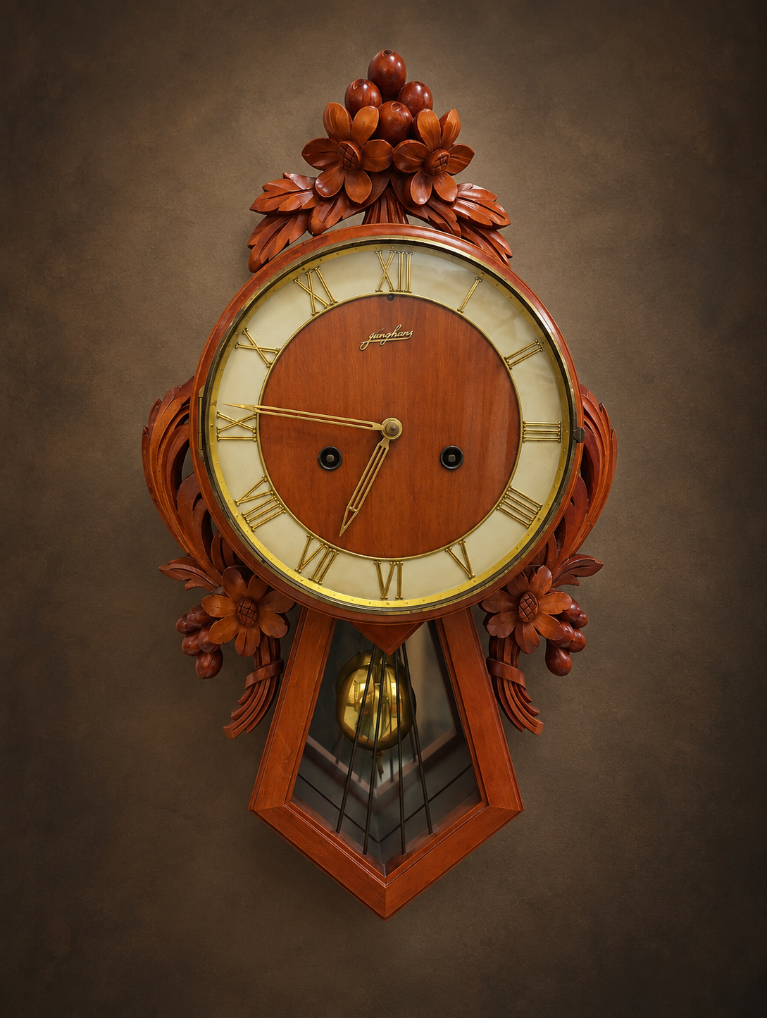 Antique German Junghans hand-carved wooden mechanical wall clock with Roman numeral dial, decorative leaded glass and brass pendulum, c. 1920s.