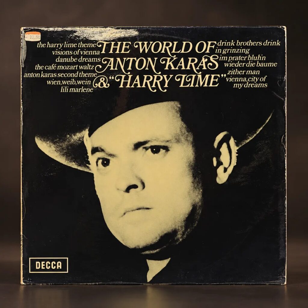 Vintage DECCA The World of Anton Karas and Harry Lime vinyl record sleeve featuring a monochrome portrait and gold lettering.