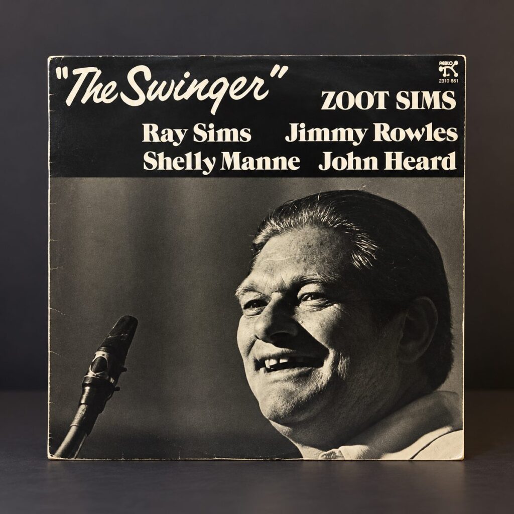 Vintage 1981 Zoot Sims The Swinger jazz vinyl LP by Pablo Records, featuring a black-and-white portrait cover with Ray Sims, Jimmy Rowles, Shelly Manne and John Heard.